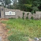 Entrance area cleanup with fresh pine straw in Flora MS