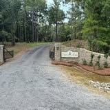 Entrance area cleanup with fresh pine straw in Flora MS